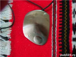 Medalion in forma de scoica