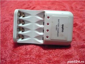 Incarcator Batery Sanyo merge perfect incarca 2 tipuri de batery (Schimb)