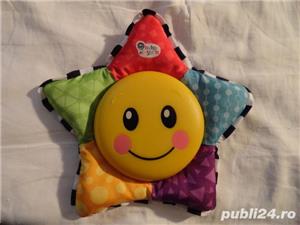 Jucarie steluta muzicala Baby Einstein cu melodii si lumini