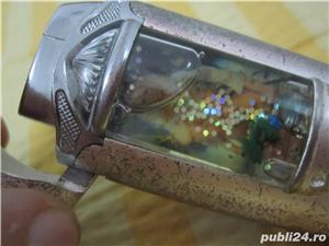 Bricheta foarte rara,(poza sexy+lumini)anii 90 de colectie-ieftina 