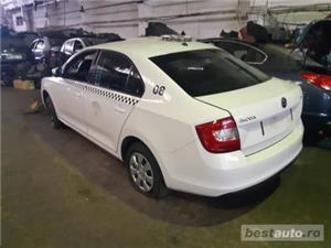 Dezmembram Skoda Rapid - imagine 4