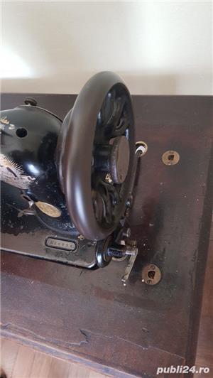 Mașină de cusut Singer 