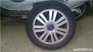 Vând 4 jante aluminiu 205/55 R 16, echipamente cu cauciucuri Hankook, folosite, uzura micaauciucuri  - imagine 2