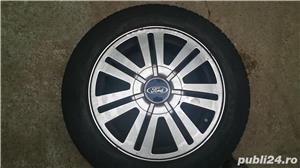 Vând 4 jante aluminiu 205/55 R 16, echipamente cu cauciucuri Hankook, folosite, uzura micaauciucuri  - imagine 3