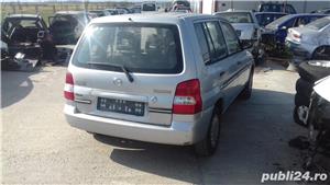 Dezmembrez Mazda Demio 1.3 i 63 cp an 2000 ! - imagine 5