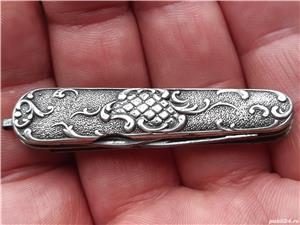 Briceag placat argint