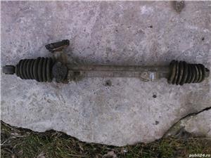 Dacia 1300,1310 dezmembrata: usa sofer, lonjeron dr., caseta directie, punte spate, jante, geamuri - imagine 4