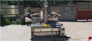 Masina de impachetat in plasa legume si fructe, cu etichetare, marca Giro, tipul Girplus RS Classic.