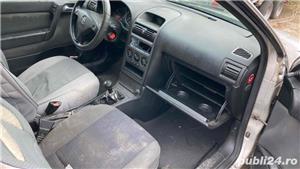 dezmembrez opel astra G 1.2 benzina euro 4 an.2003 cu 3 usi - imagine 6