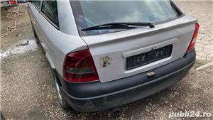dezmembrez opel astra G 1.2 benzina euro 4 an.2003 cu 3 usi - imagine 3