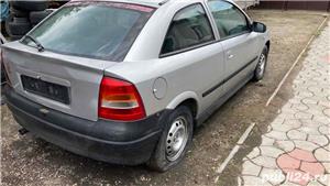 dezmembrez opel astra G 1.2 benzina euro 4 an.2003 cu 3 usi - imagine 2