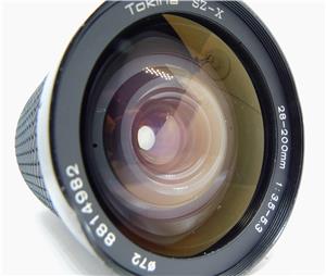 Tokina SZ-X 28-200mm f/3.5-5.3 montura Canon FD (push-pull) - imagine 7