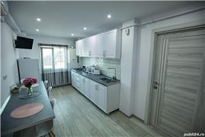 CAZARE Apartament Serban - imagine 1