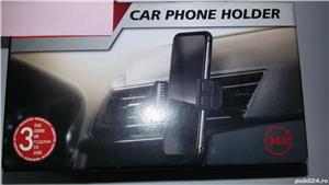 Suport reglabil auto pentru telefon.