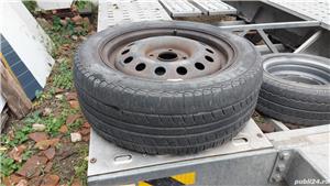 Roata rezerva in 4 prezoane pentru Ford