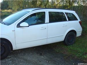 Usa OPEL ASTRA H stanga spate combi 