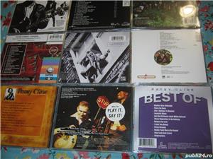 DEMIS ROUSSOS,JERRY LEE LEWIS,paul anka,cher,peter gabriel,paul simon,JULIO IGLESIAS,Madonna,U 2, - imagine 9