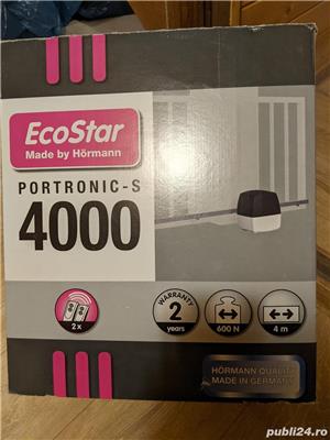 Vand  actionare poarta.