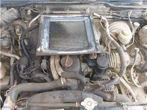 Dezmembrez nissan terrano ii 5p  2.7 tdi 125cp an 2002   - imagine 6