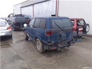 Dezmembrez nissan terrano 2 3p 2.7tdi 125cp an 2001  - imagine 2
