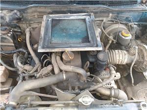 Dezmembrez nissan terrano 2 3p 2.7tdi 125cp an 2001  - imagine 4