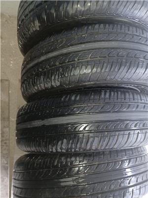 De vanzare 2 jante noi R 15 , pentru Dacia Lodgy  si 4 jante  cu tot cu cauciucuri  noi de vara R14 - imagine 6