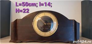 Ceas cu pendula internă pentru semineu