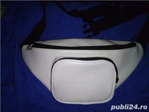 Vând borseta sport /fashion, piele ecologica, model deosebit, produs de calitate. Import. 