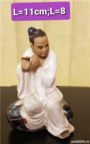 Bibelou " Cântăreț sezand"