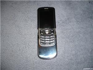 Telefon Nokia Carcasa Metalica Pliabil Este aproape nou functioneaza perfect (Schimb)