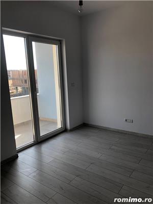 Apartament 2 camere cu o suprafata de 55 mp utili, decomandat, balcon, loc de parcare acoperit. - imagine 3