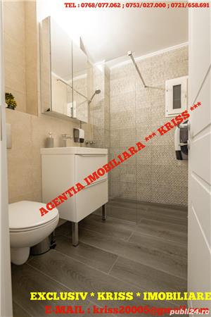 Apartament 4 camere CENTRAL de lux etaj 1 mobilat Și utilat Complet 130 mp. + Terasă - imagine 7