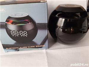 Boxa portabila cu ceas
