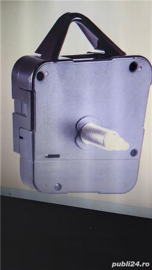 Mecanism ceas de perete