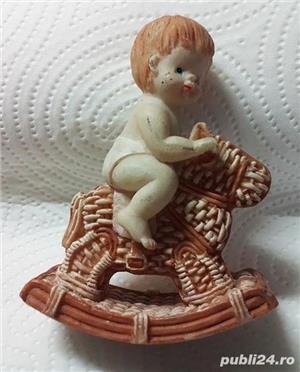 bebe pe căluț troian balansoar, figurină de colecție, anii '90