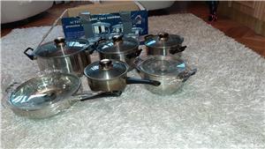 set oale inox fund dublu cu capac sticla termrezistenta si storcator de fructe