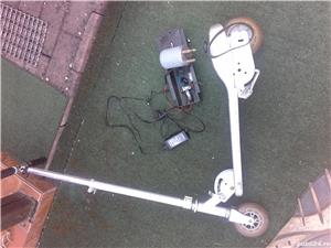 vand motor+incarcatorde la trotineta electrica