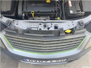 Grila fara semn,eleron luneta,cheie briceag cu cip,tavita, si mocheta portbagaj pentru Zafira B - imagine 5