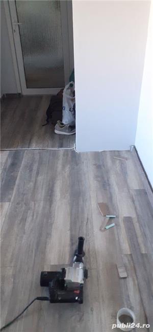 Execut lucrări de zugrăvit