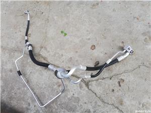 conducta AC opel astra h 