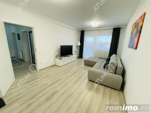 Apartament cu 2 camere decomandate si balcon etaj intermediar
