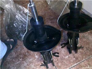 amortizor monroe  fata mazda 323f  nou - imagine 8