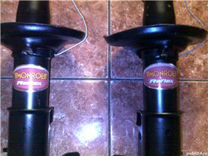 amortizor monroe  fata mazda 323f  nou - imagine 4