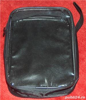 borsetă cu o latură transparentă