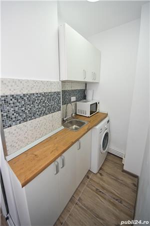 Regim hotelier Apartament  tiglina 1  - imagine 2