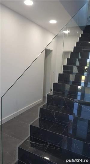 O altă lucrare a firmei noastre o balustradă cu sticlă securizată și asamblată în conectori inox - imagine 2