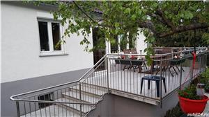 Balustradă din inox cu intermediare în plan vertical si prindere lateral