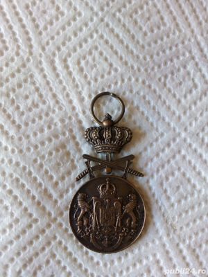 Medalie serviciul credincios  cu spade 