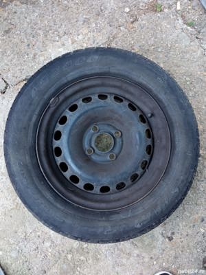Vand  jante din tabla de 14" cu 4 prezoane, 4x100 + cauciucuri M+S Opel sau alte auto