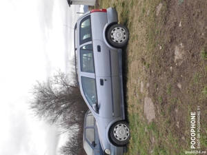 Dezmembrez Opel Astra G Caravan 1.6 benzină, an 2003 - imagine 5